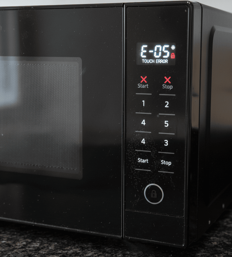 Moisture affecting microwave touch panel causing unresponsive buttons.